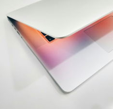 apple-mac-book-air-on-wooden-surface.jpg Apple MacBook air on wooden surface